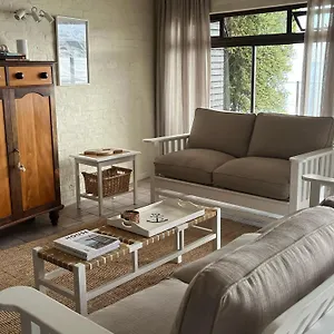 By Apartment